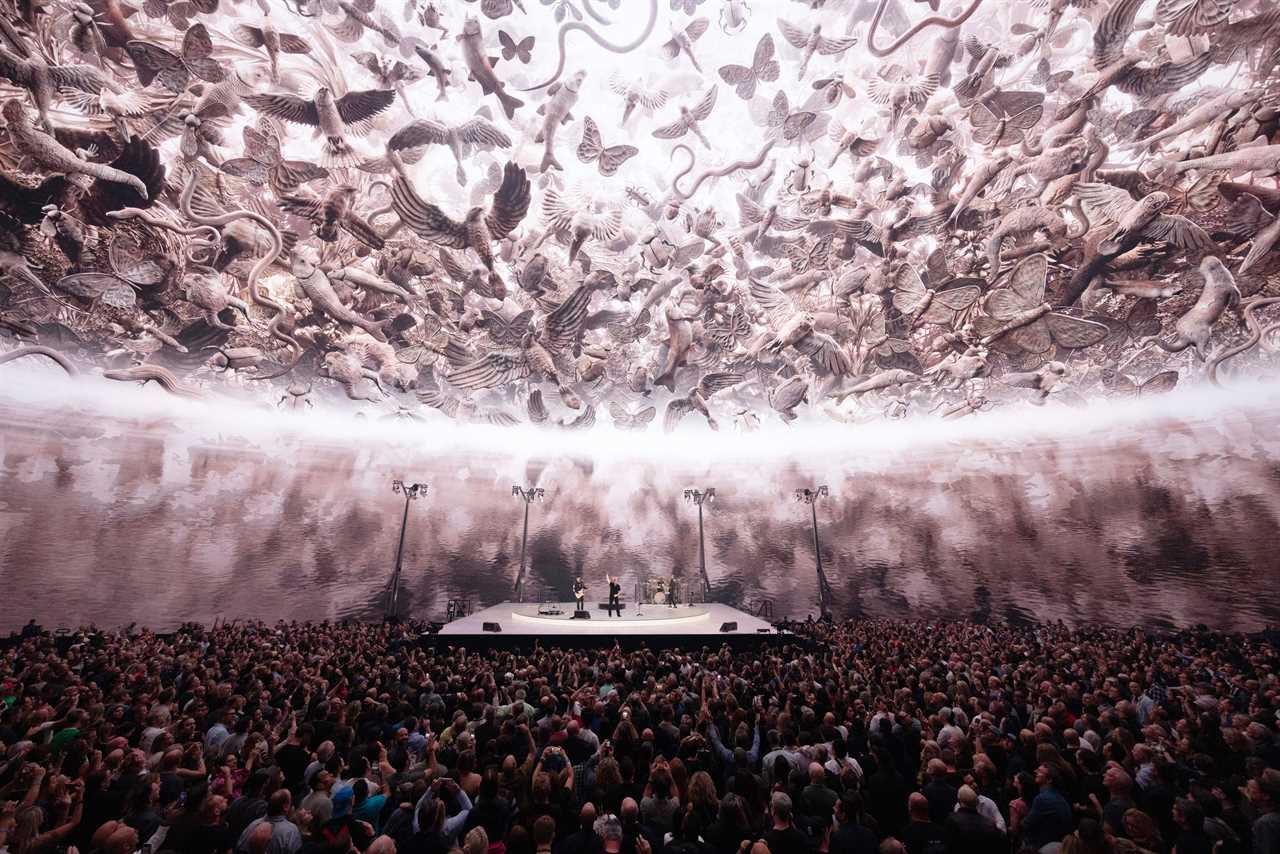 Bono, The Edge, Adam Clayton and Bram van den Berg of U2 perform during U2:UV Achtung Baby Live at Sphere on September 30, 2023 in Las Vegas, Nevada.