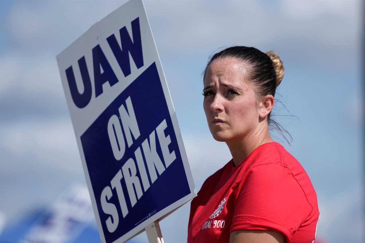 UAW member pickets during union strike at Ford plant in Wayne, Michigan.