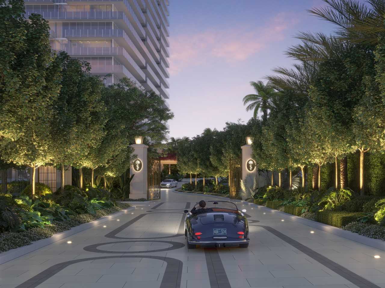 car driving into luxury gated entryway