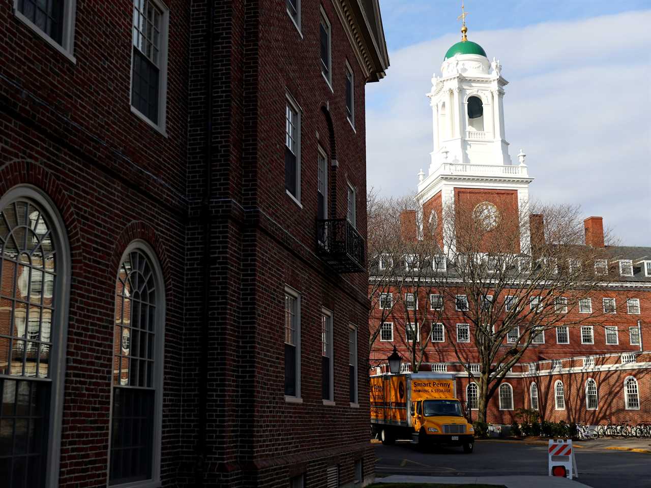 A moving truck sits in front of Eliot House on the campus of Harvard University