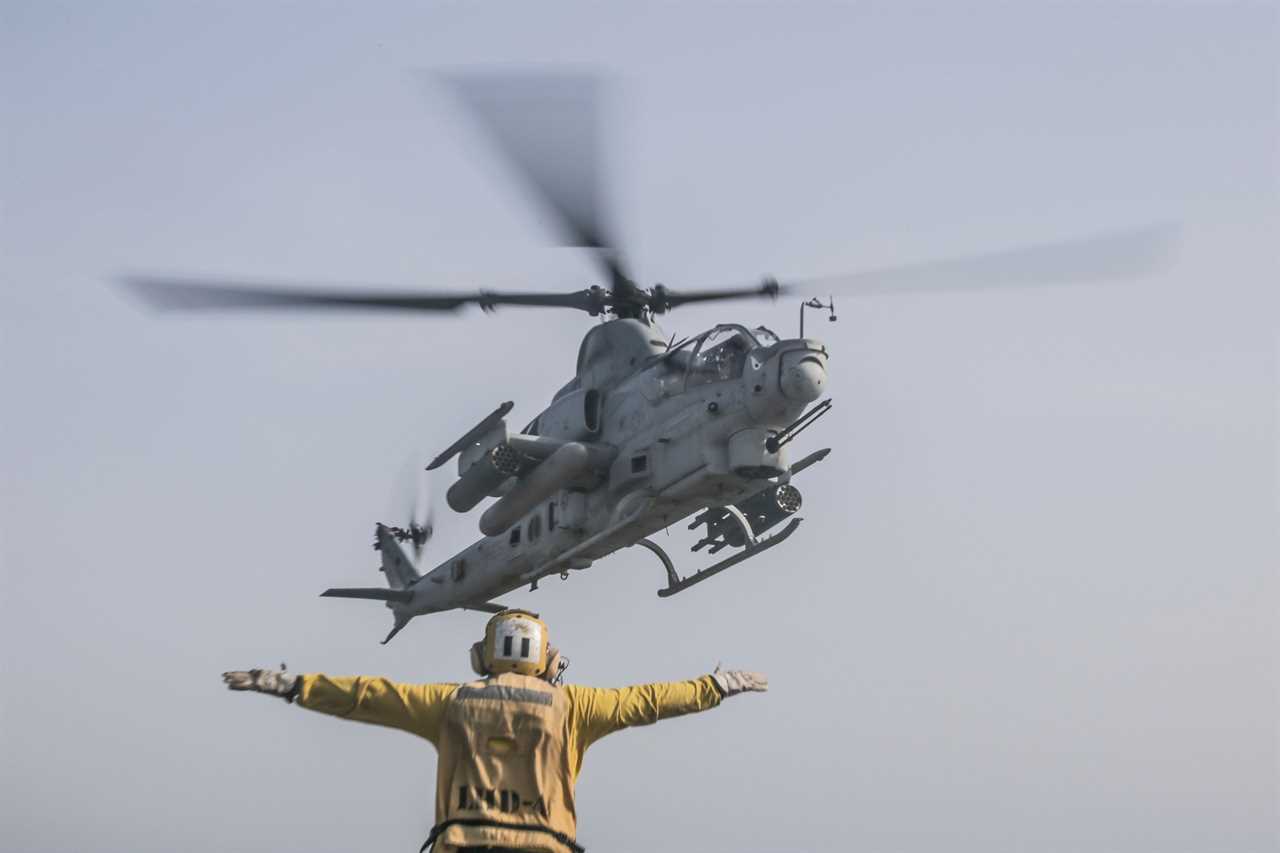 An AH-1Z Viper helicopter attached to Marine Medium Tiltrotor Squadron 163 (Reinforced), 11th Marine Expeditionary Unit (MEU), takes off from the amphibious assault ship USS Boxer (LHD 4).