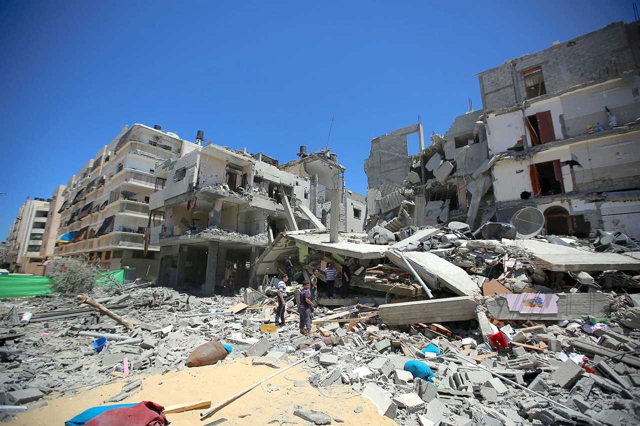 Israel Gaza damaged destroyed buildings Protective Edge