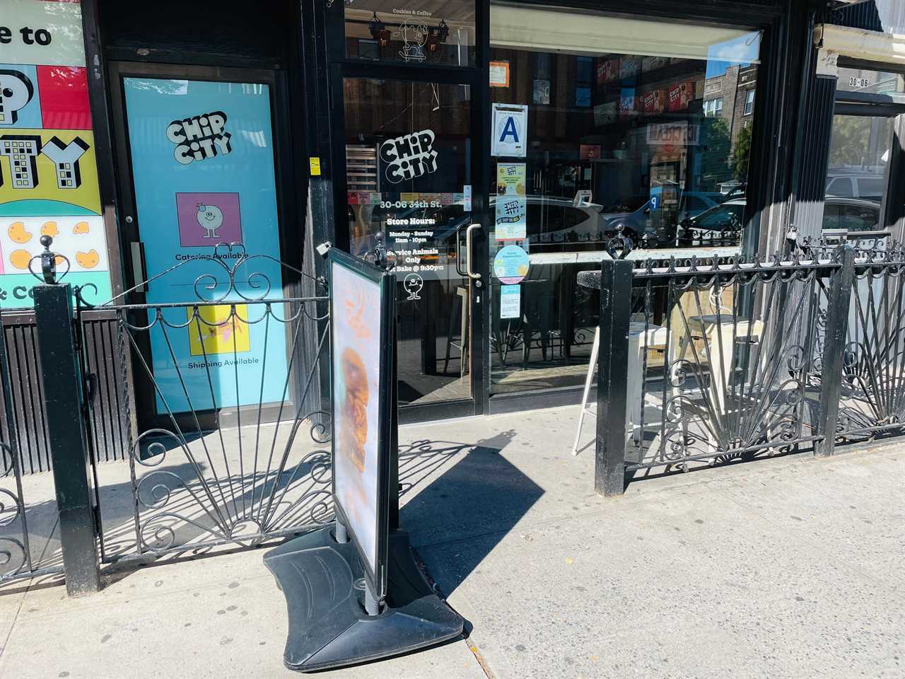 the exterior of Chip City Astoria shows a small counter with two stools