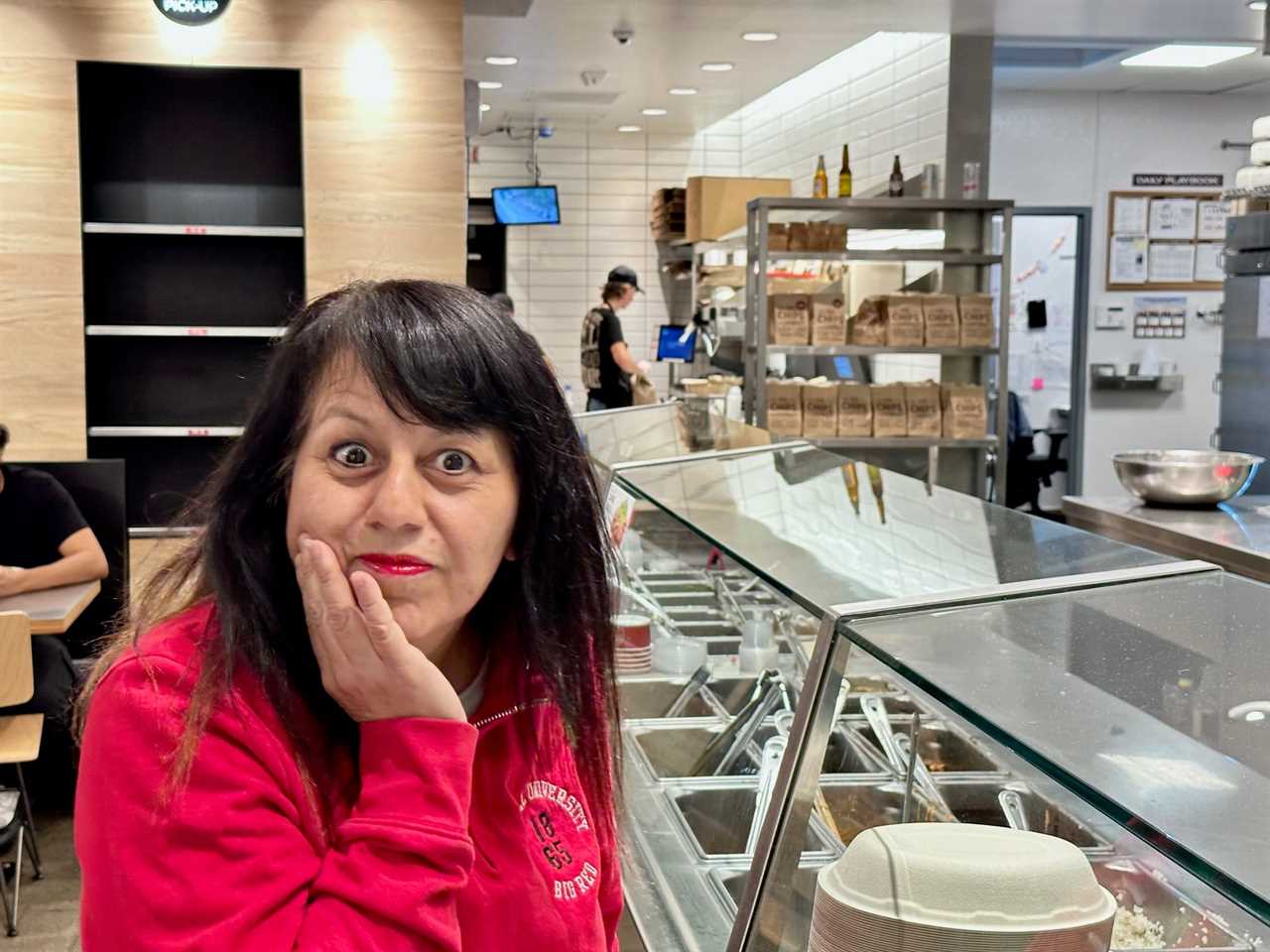 Nancy Luna waits for someone to help her at Chipotle.