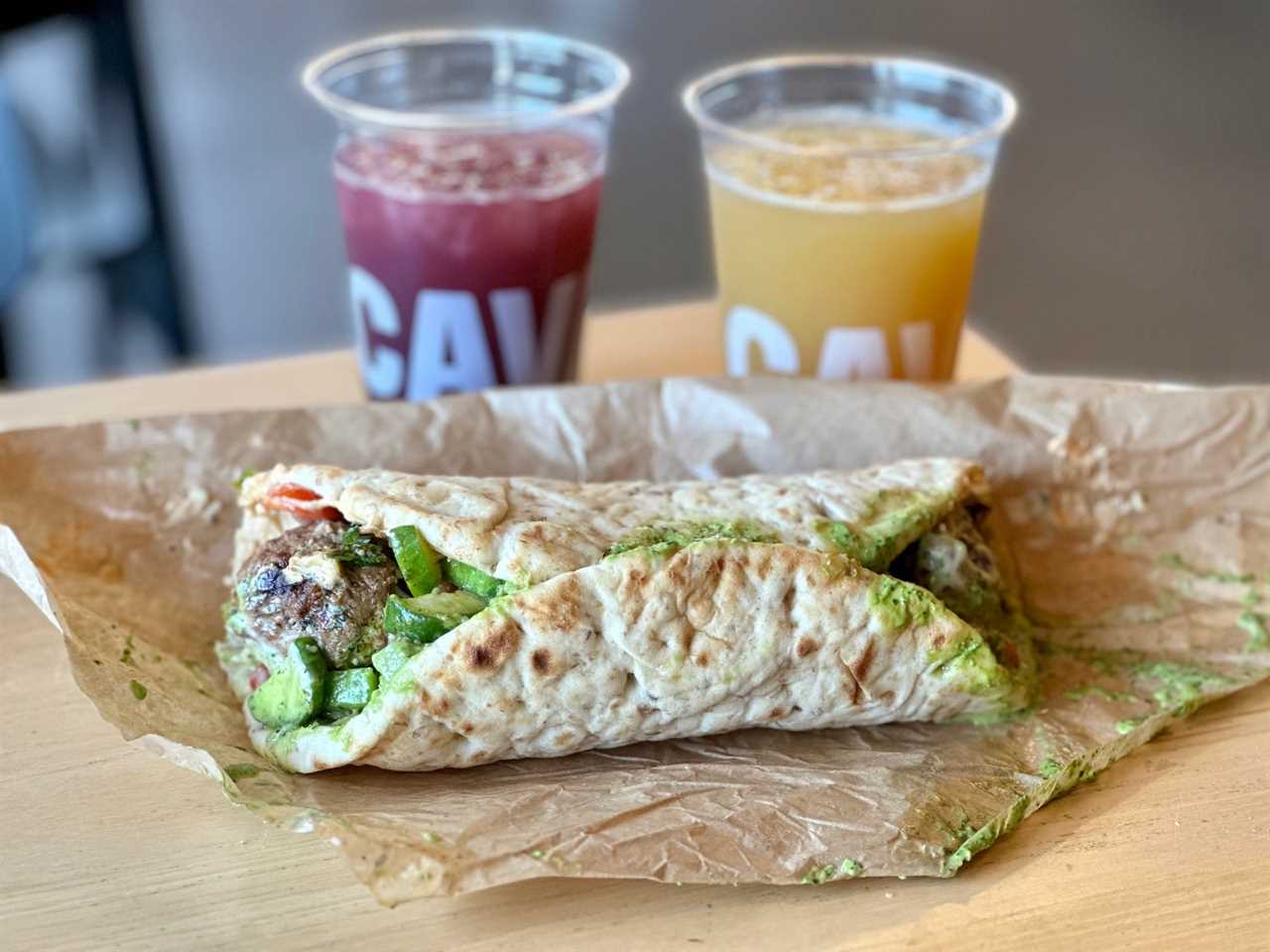 Cava's pita wraps are bigger than Chipotle's burritos, but messy.