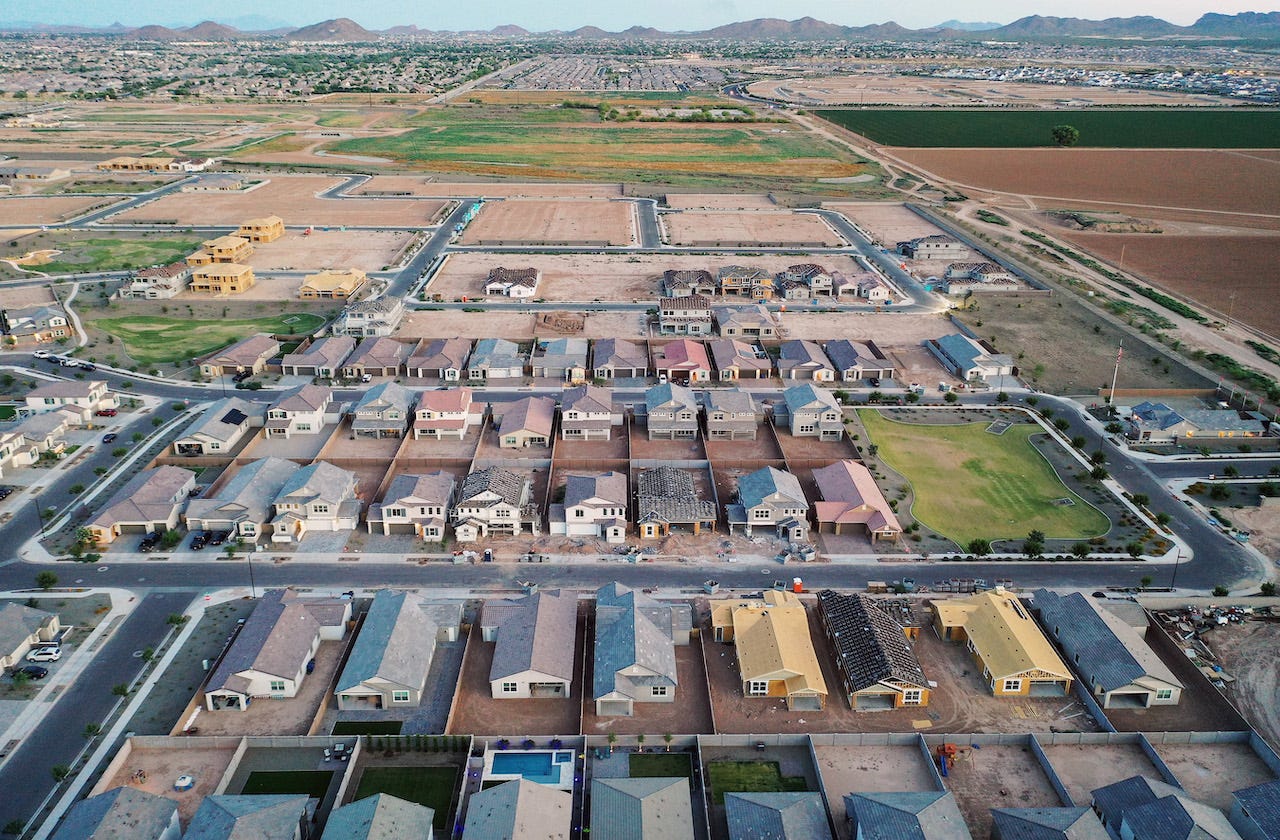 An aerial view of new home construction at a housing development in the Phoenix suburbs on June 9, 2023 in Queen Creek, Arizona.