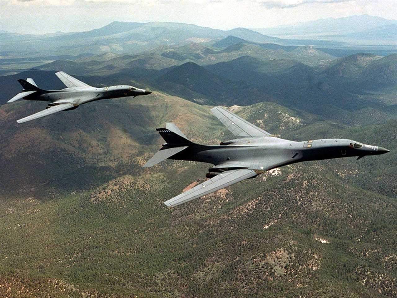 A pair of B-1B Lancer bombers fly over Wyoming in aerial photo