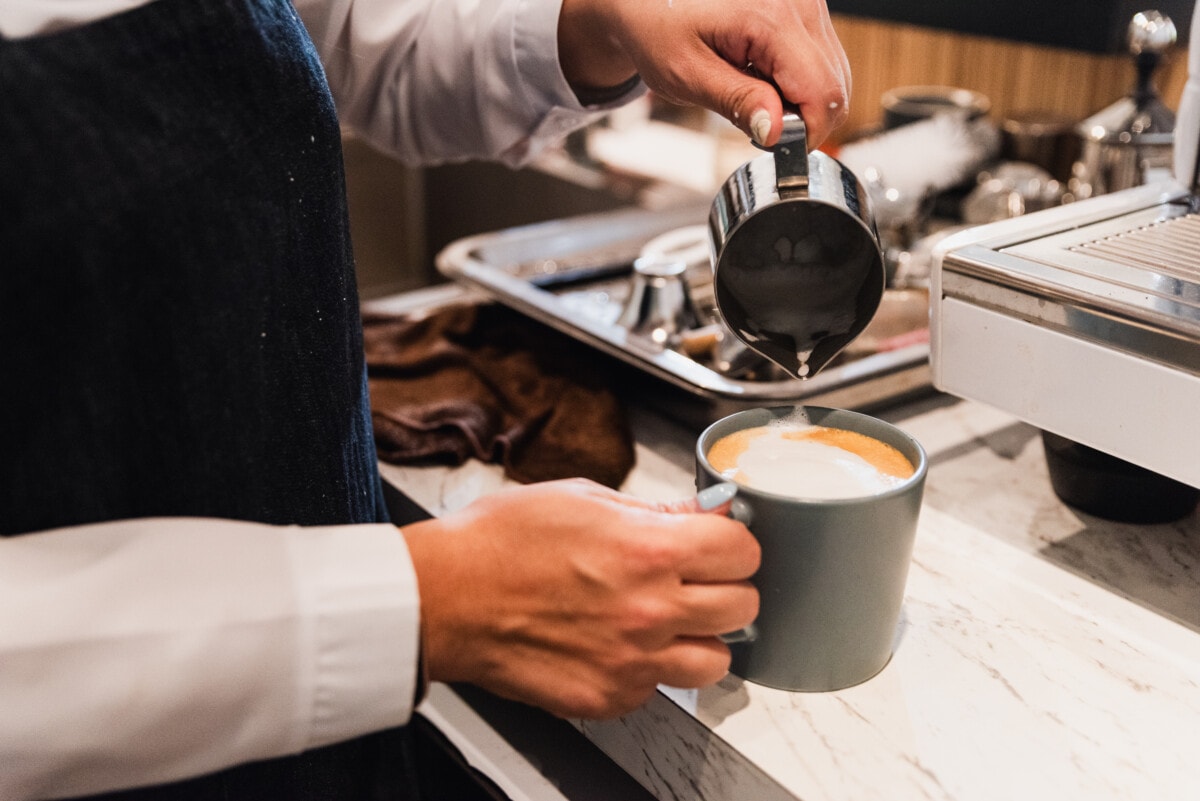 Barista creating latte art