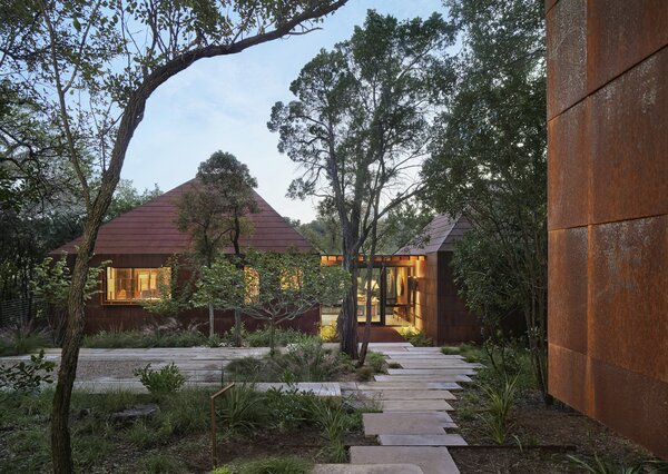 Cor-Ten Steel Cloaks a Set of Four Structures That Form a Texas Home