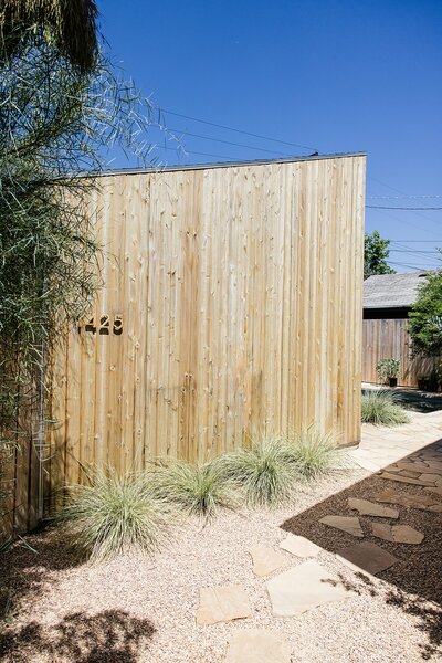 In contrast to the bungalow, the ADU's cedar siding will weather and patina over time