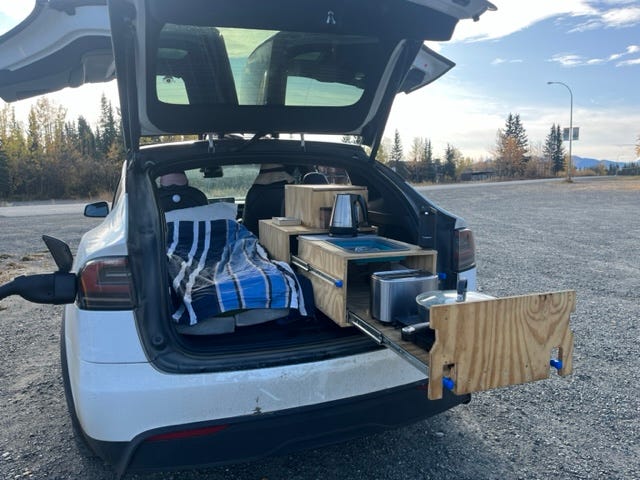 A Tesla owner built a makeshift kitchen for his EV.