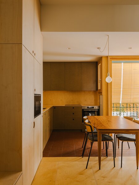 From Cabinets to Couches: Plywood Punches Up Nearly Every Corner of This Spanish Apartment