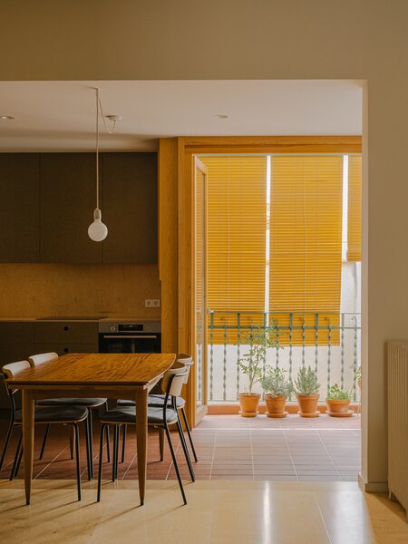 From Cabinets to Couches: Plywood Punches Up Nearly Every Corner of This Spanish Apartment