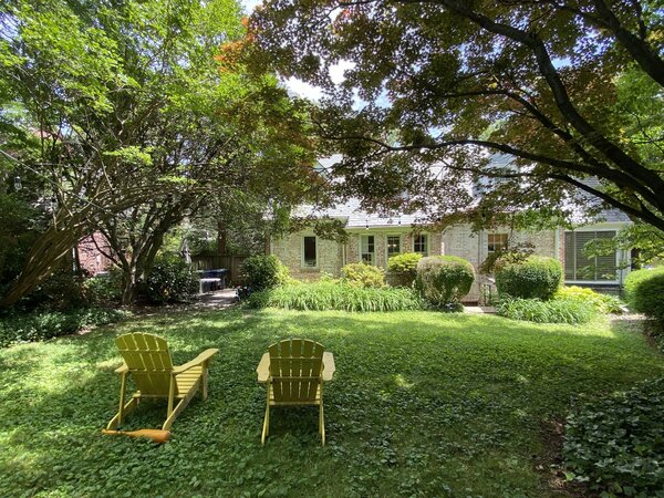 The original Cape Cod-style house featured an ample backyard, leaving room for expansion without losing its leafy ambiance.