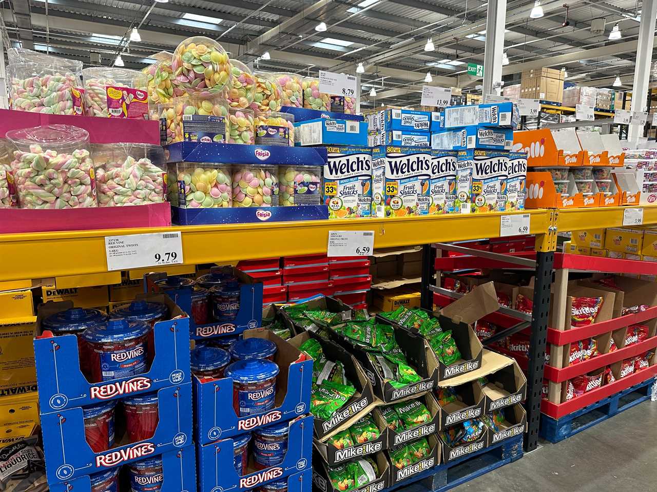 The candy aisle at Costco in London, featuring Welch's Fruit Snacks, Red Vines, Skittles, Trolls, Mike & Ike