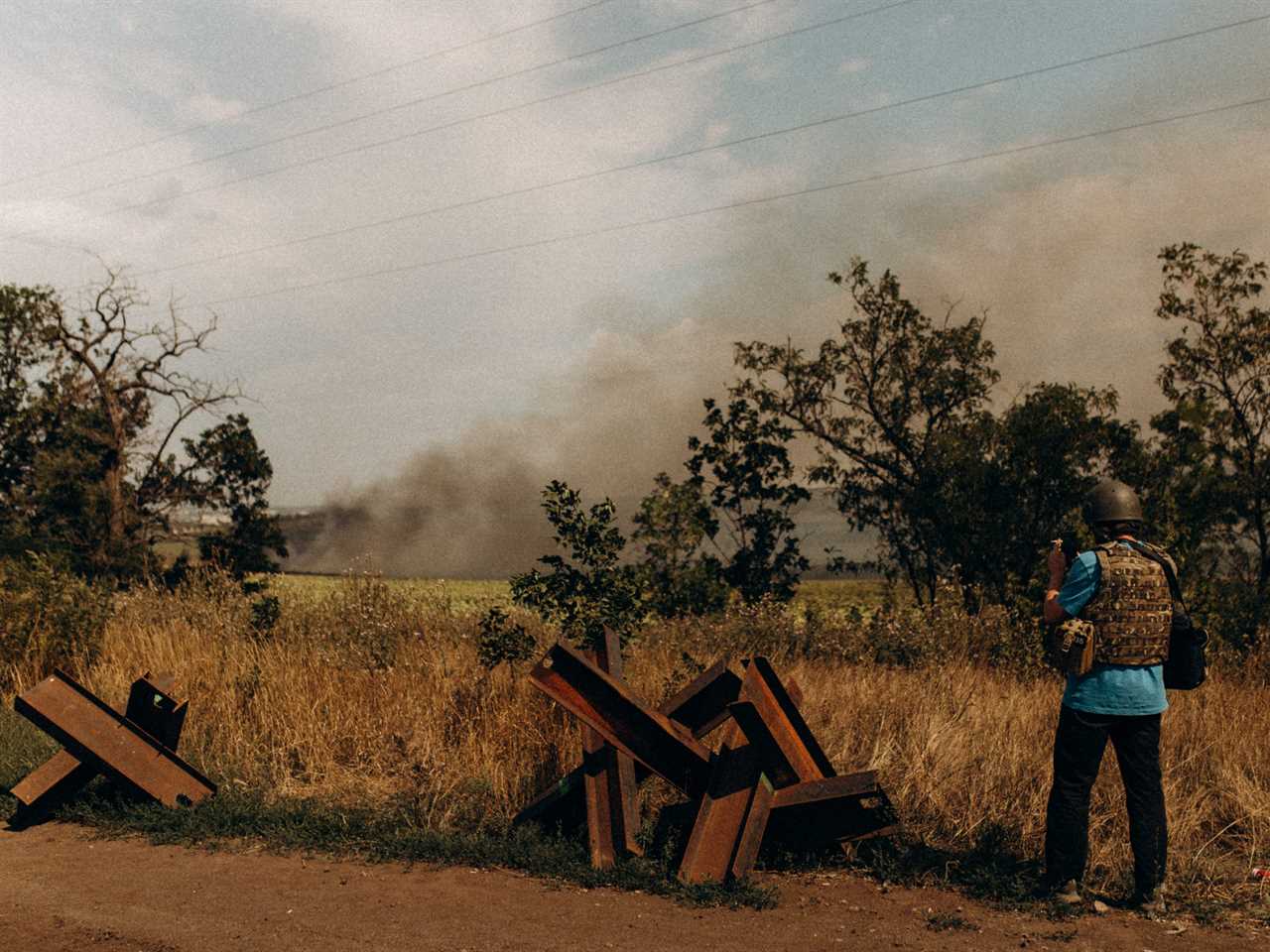 A smoke-filled road in the Donbas on the way to Soledar.