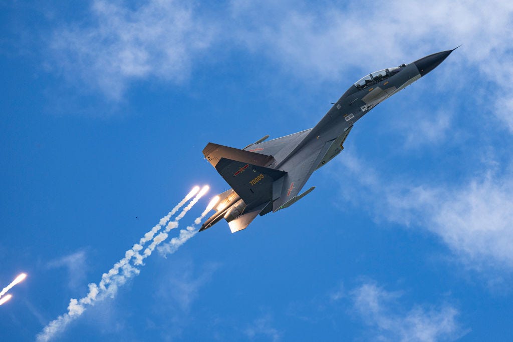 A J-11BS fighter jet of the People's Liberation Army Air Force (PLAAF) performs in the sky during Changchun Air Show at Changchun Dafangshen Airport on August 27, 2022, in Changchun, Jilin Province of China.