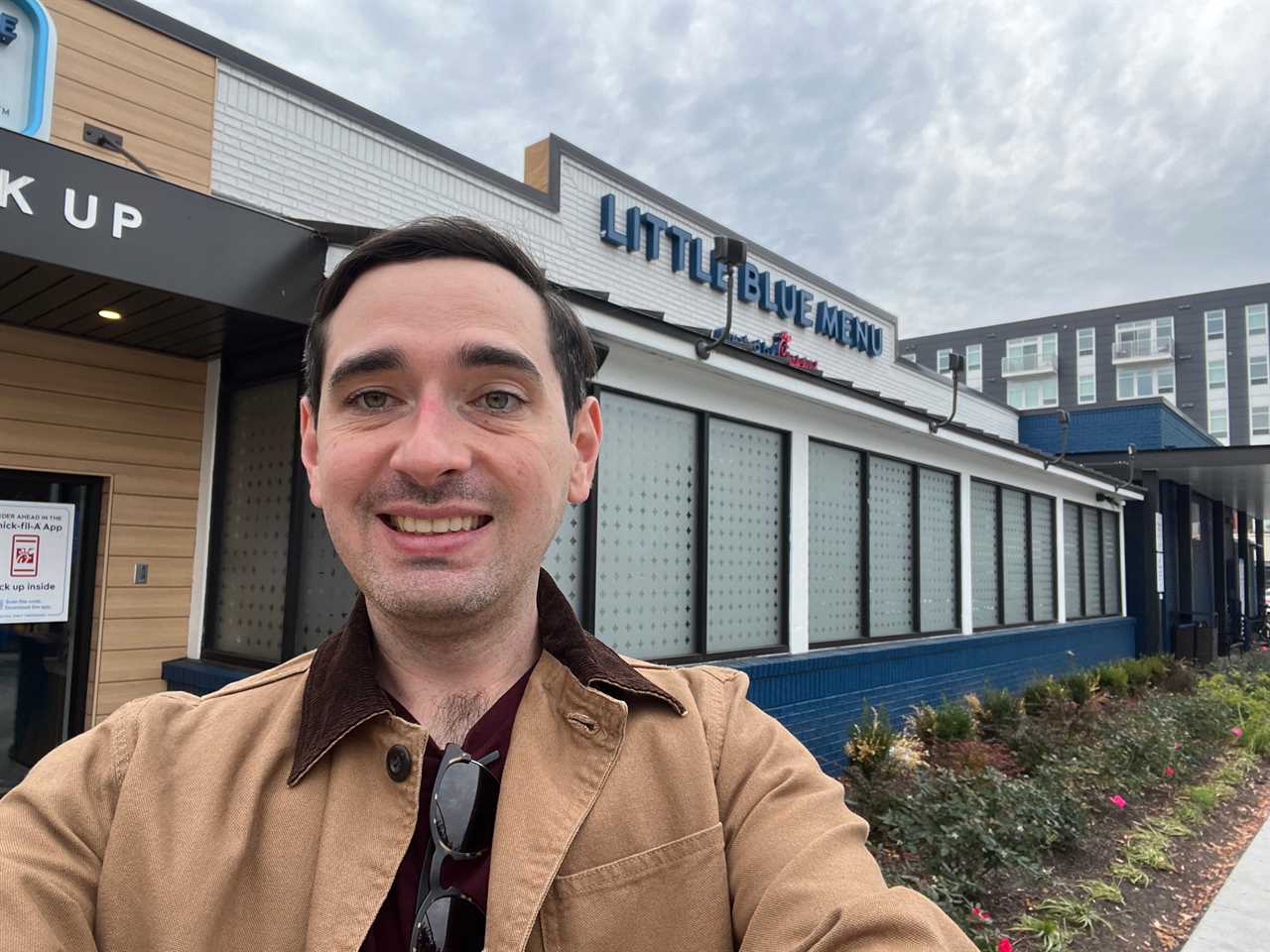 Insider reporter Alex Bitter stands outside of a Little Blue Menu location in College Park, Maryland