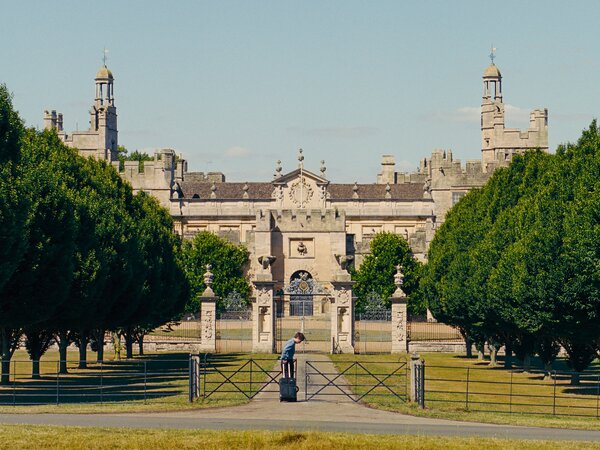 In Emerald Fennell’s <i>Saltburn</i>, Oxford newcomer Oliver Quick (Barry Keoghan) is invited by fellow student Felix Catton (Jacob Elordi) to spend the summer at his aristocratic family’s country house.