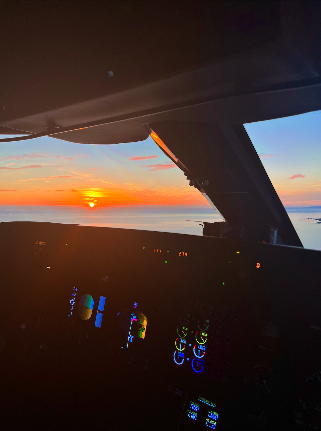 Sunrise views from the pilot's cockpit of a Gulfstream jet