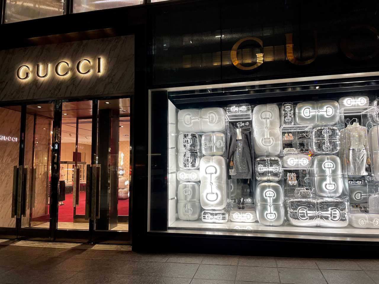 The front of the Gucci store and silver displays in the window