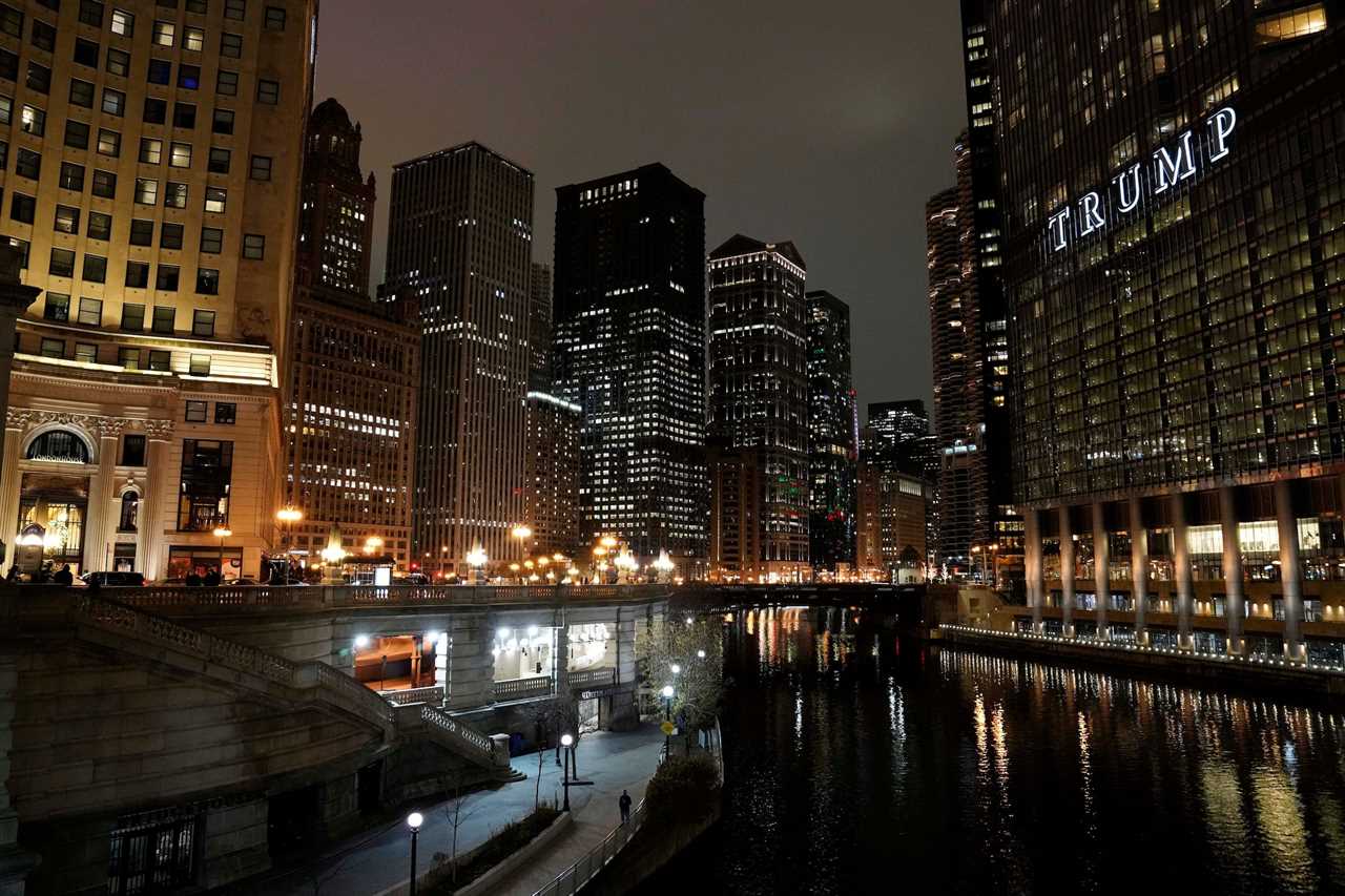 The Chicago skyline at night, showing Trump International Hotel & Tower.