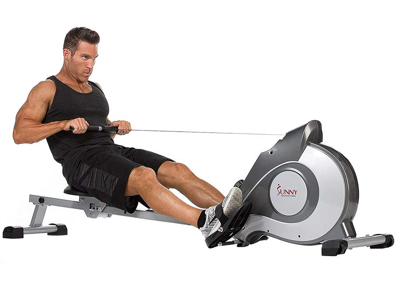 a person uses the Sunny Health & Fitness Magnetic Rowing Machine against a white background.