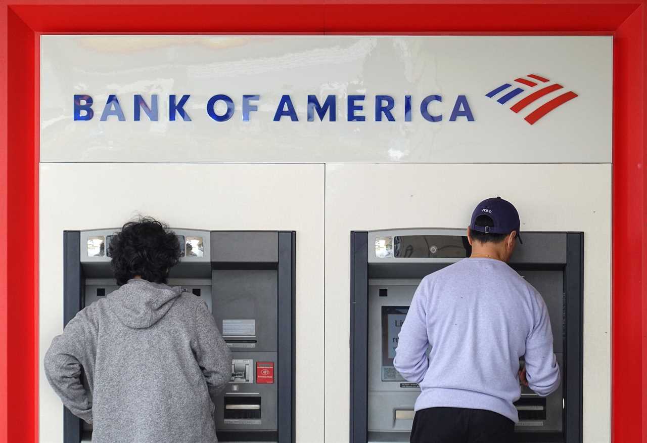 People at a Bank of America ATM