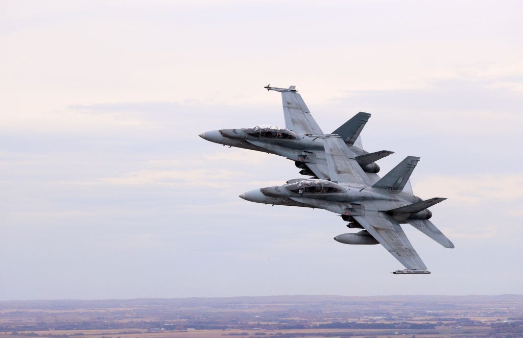 Two Royal Canadian Air Force (RCAF) CF-18 Hornet aircraft