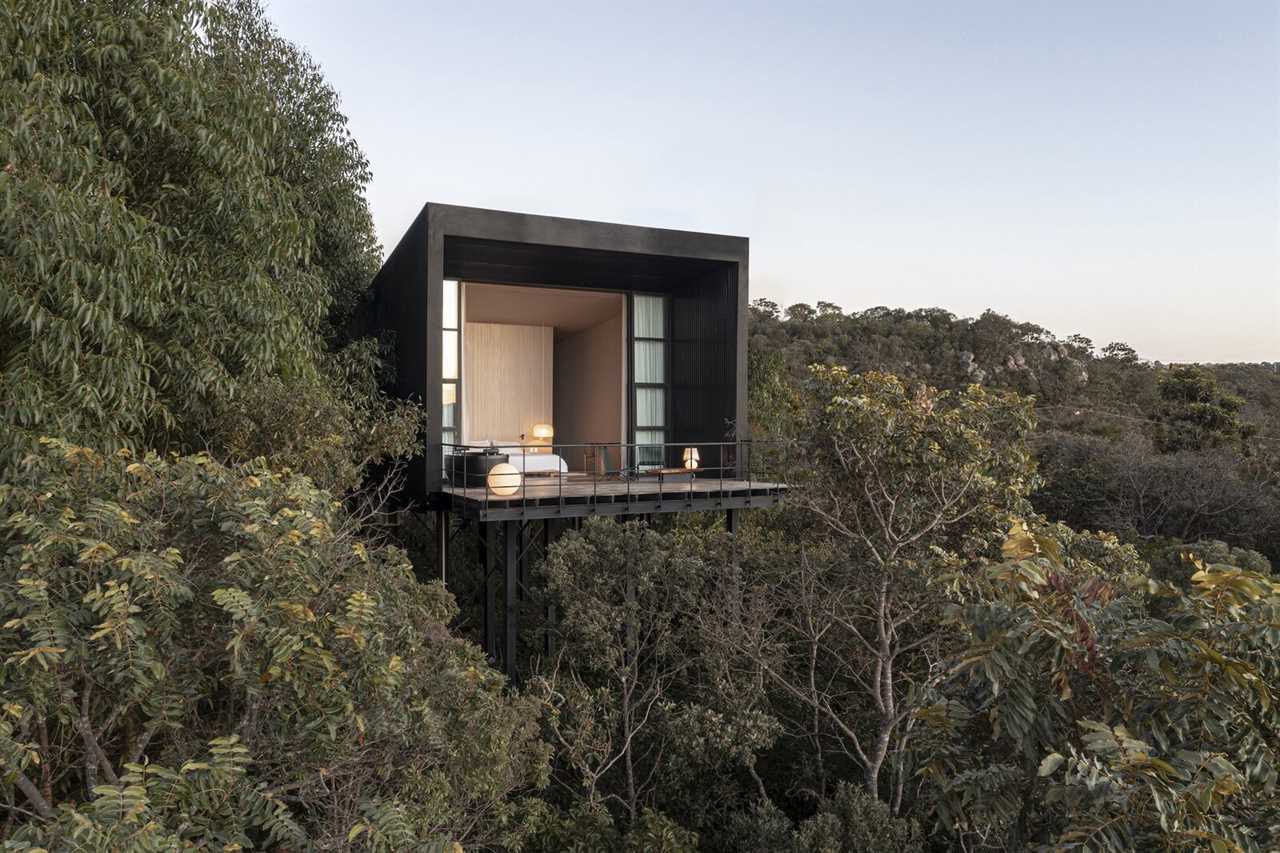 Giant Sliding Doors Reveal an Epic Treetop View at This Brazilian Retreat