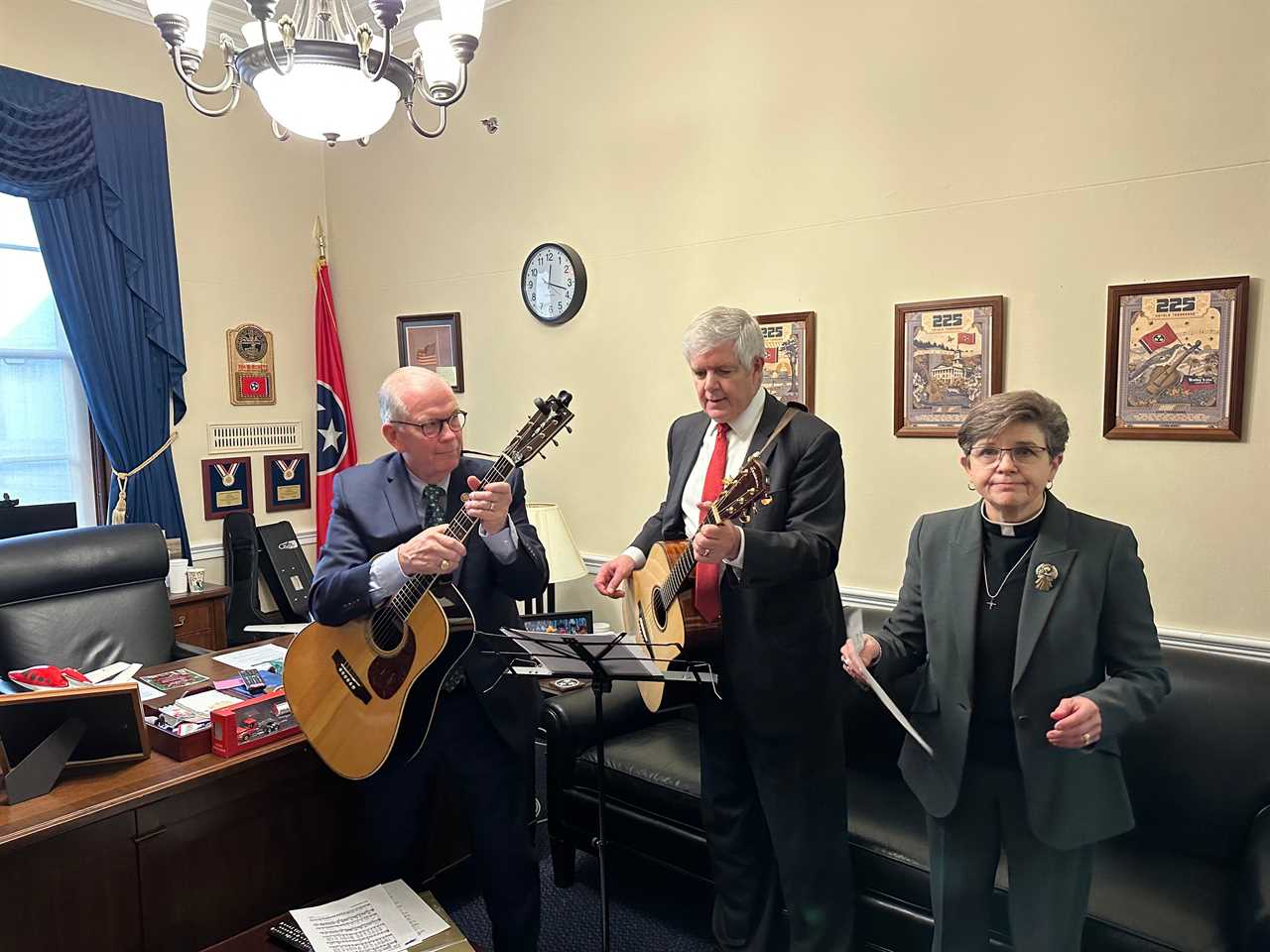 Reps. Tim Wahlberg, Cliff Bentz, and House Chaplain Margaret Kibben in Burchett's office.