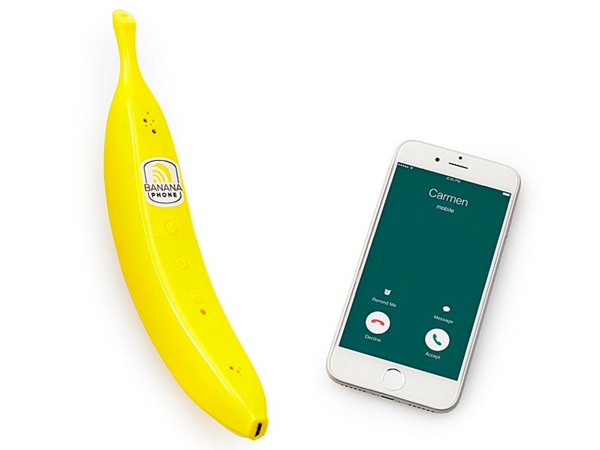 bluetooth banana phone next to a connected smartphone