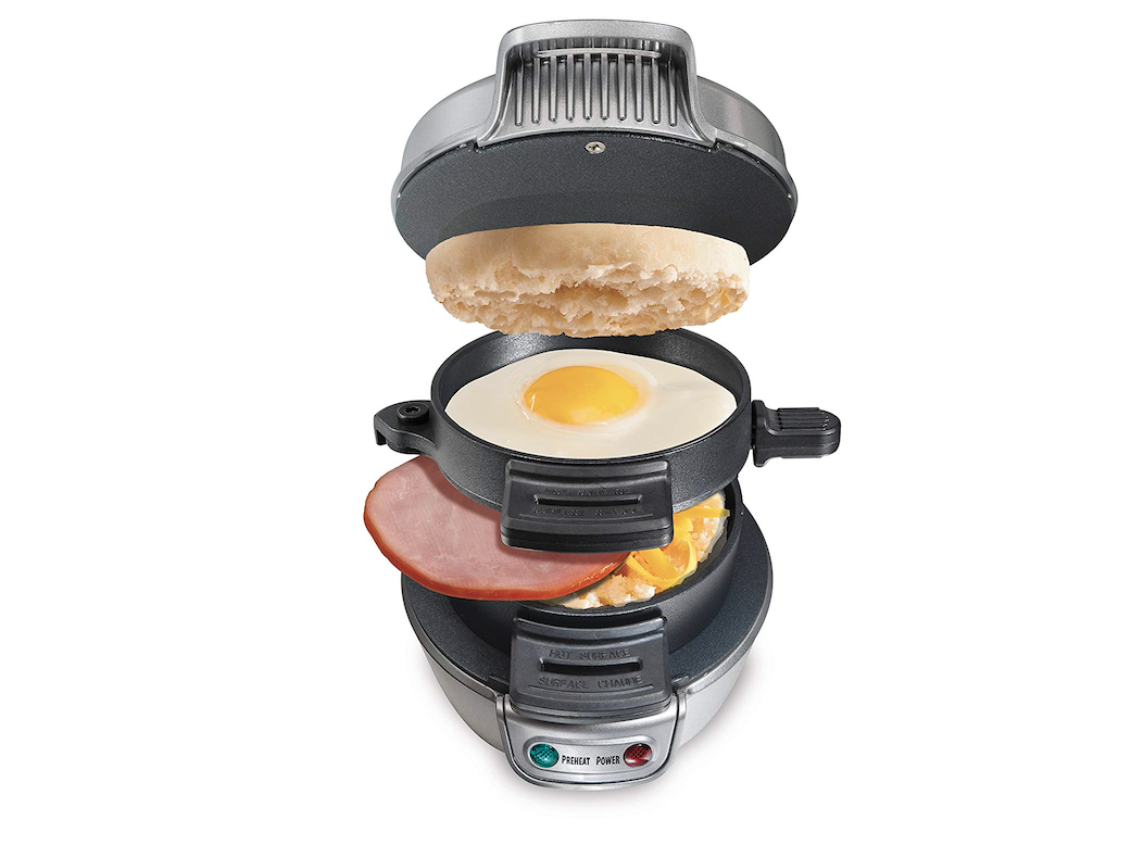 Hamilton Beach Breakfast Sandwich Maker with an english muffin, egg, and ham inside.