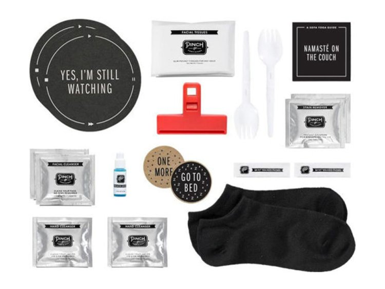 Contents of a Netflix binge survival kit including coasters, emergency socks, snack clip, face cleansing towelettes, and a sofa yoga guide.