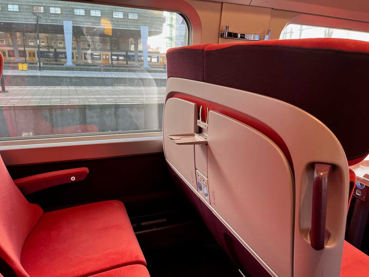 empty plush red seats on a eurostar train