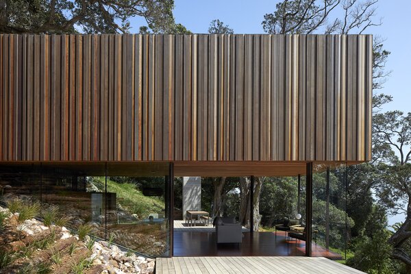 Glass Walls Make This New Zealand Beach House Look Like It’s Suspended in Midair