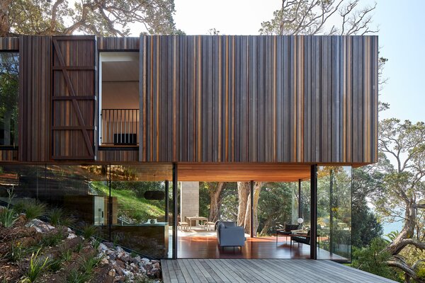 Glass Walls Make This New Zealand Beach House Look Like It’s Suspended in Midair