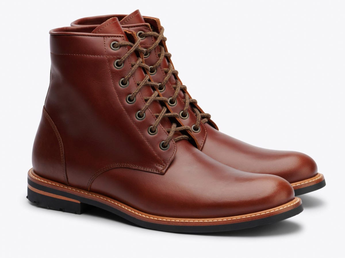 A brown pair of Nisolo All-Weather Andres Boots.