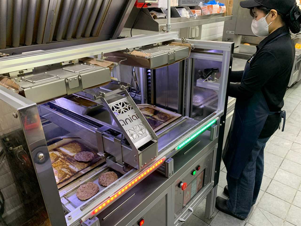 Aniai's flagship product Alpha Grill leverages advanced artificial intelligence (AI) and robotics to automate the hamburger patty cooking process, enhancing efficiency and consistency in restaurant kitchens