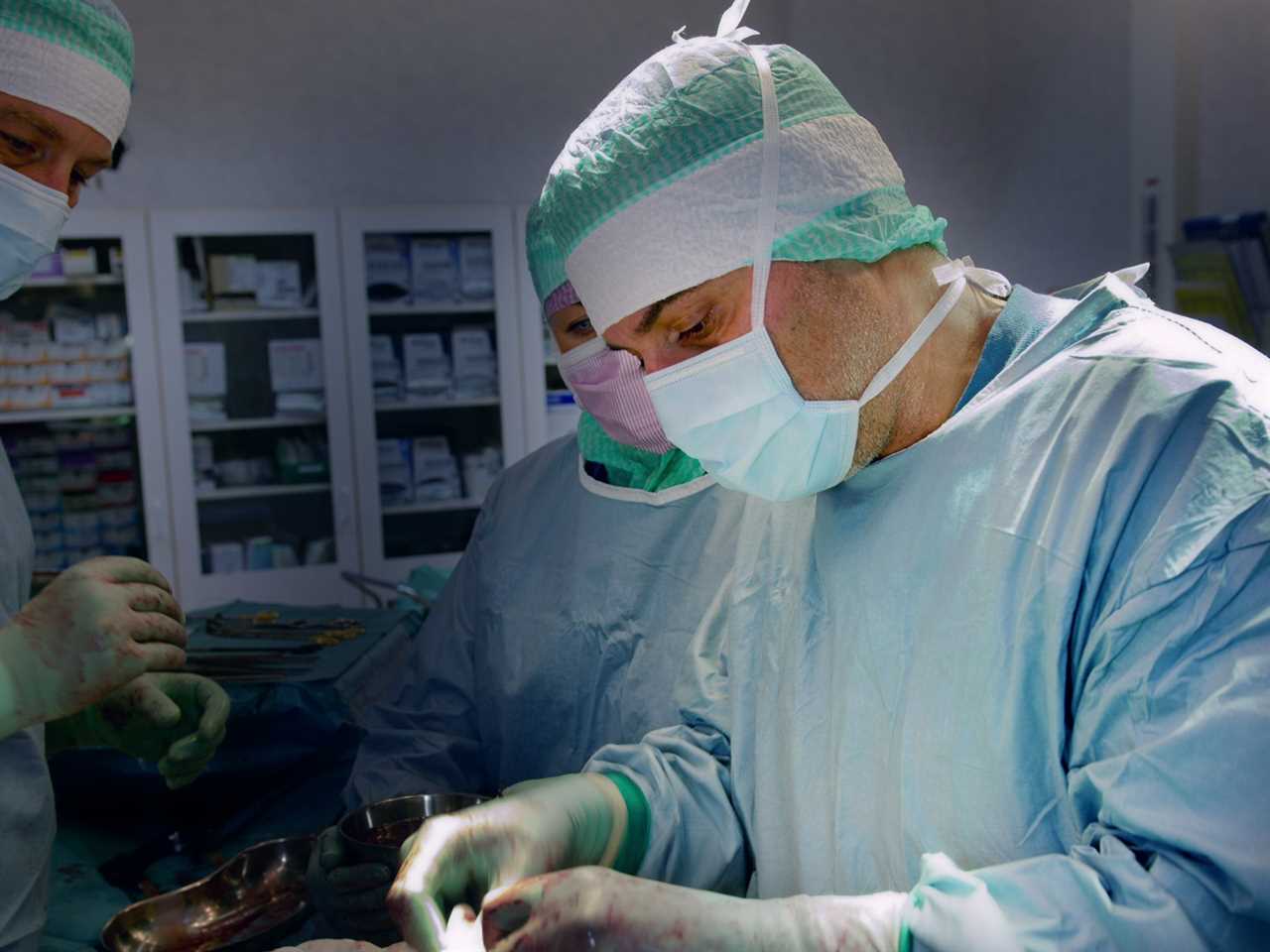 Paolo Macchiarini performs surgery in a still from "Bad Surgeon."