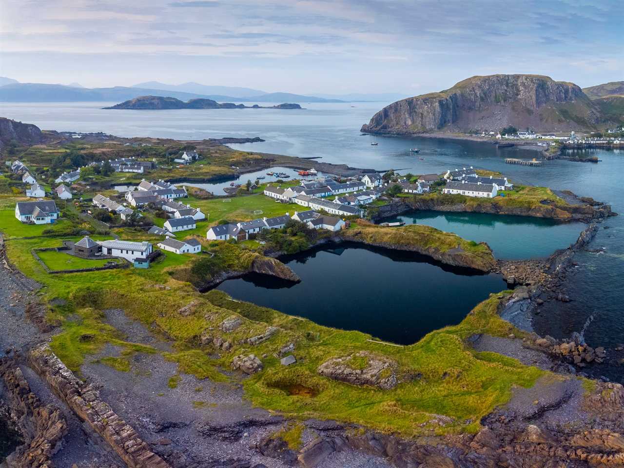 An aerial view of flooded slate quarries on Easdale Island, Scotland.