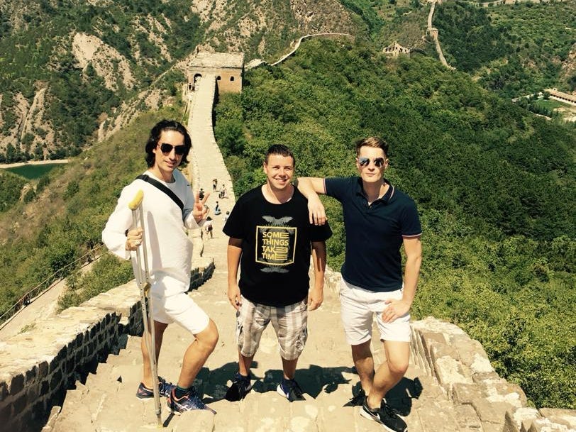 Aidan Fairhall climbing the Great Wall in crutches in 2017.