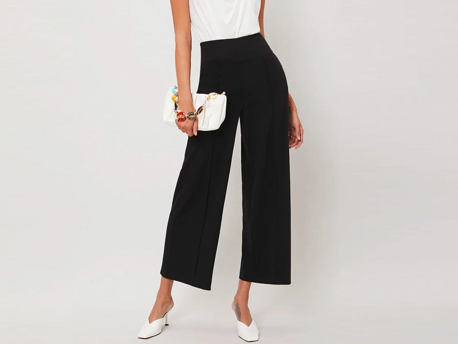 Person wearing the MOTF Viscose Wide Leg Pants in black.