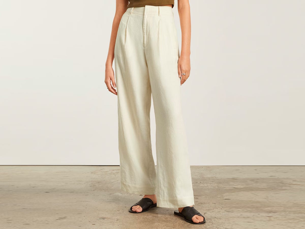 Person wearing Everlane The Linen Way-High Drape Pant in canvas.