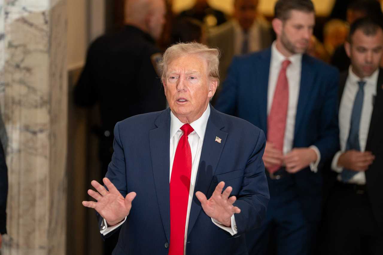 Donald Trump speaks to reporters outside his civil fraud trial in New York.