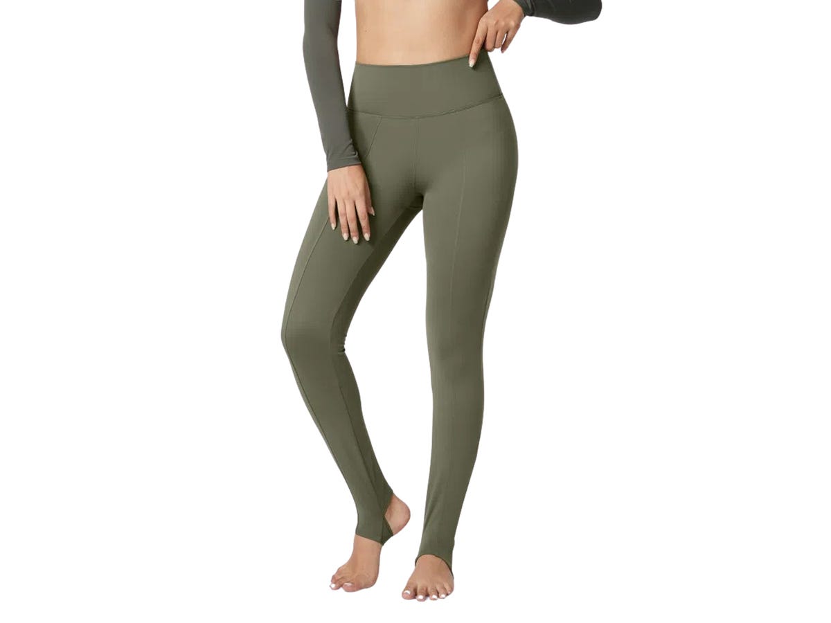 A person wearing the Halara Cloudful Fleece Yoga Stirrup Leggings.