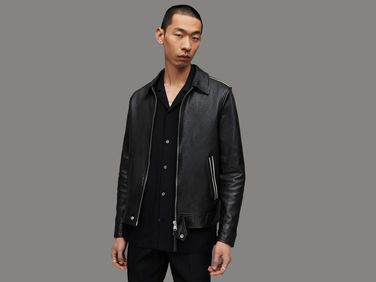 A model wearing the Regis Contrast Stitched Leather Jacket.