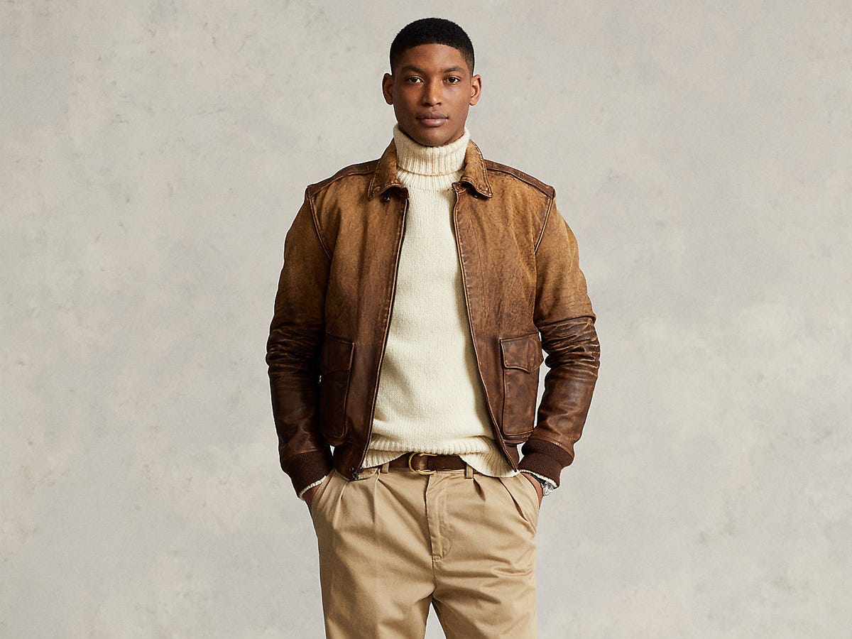 A model wearing the Ralph Lauren Leather Flight Jacket in the color teak.