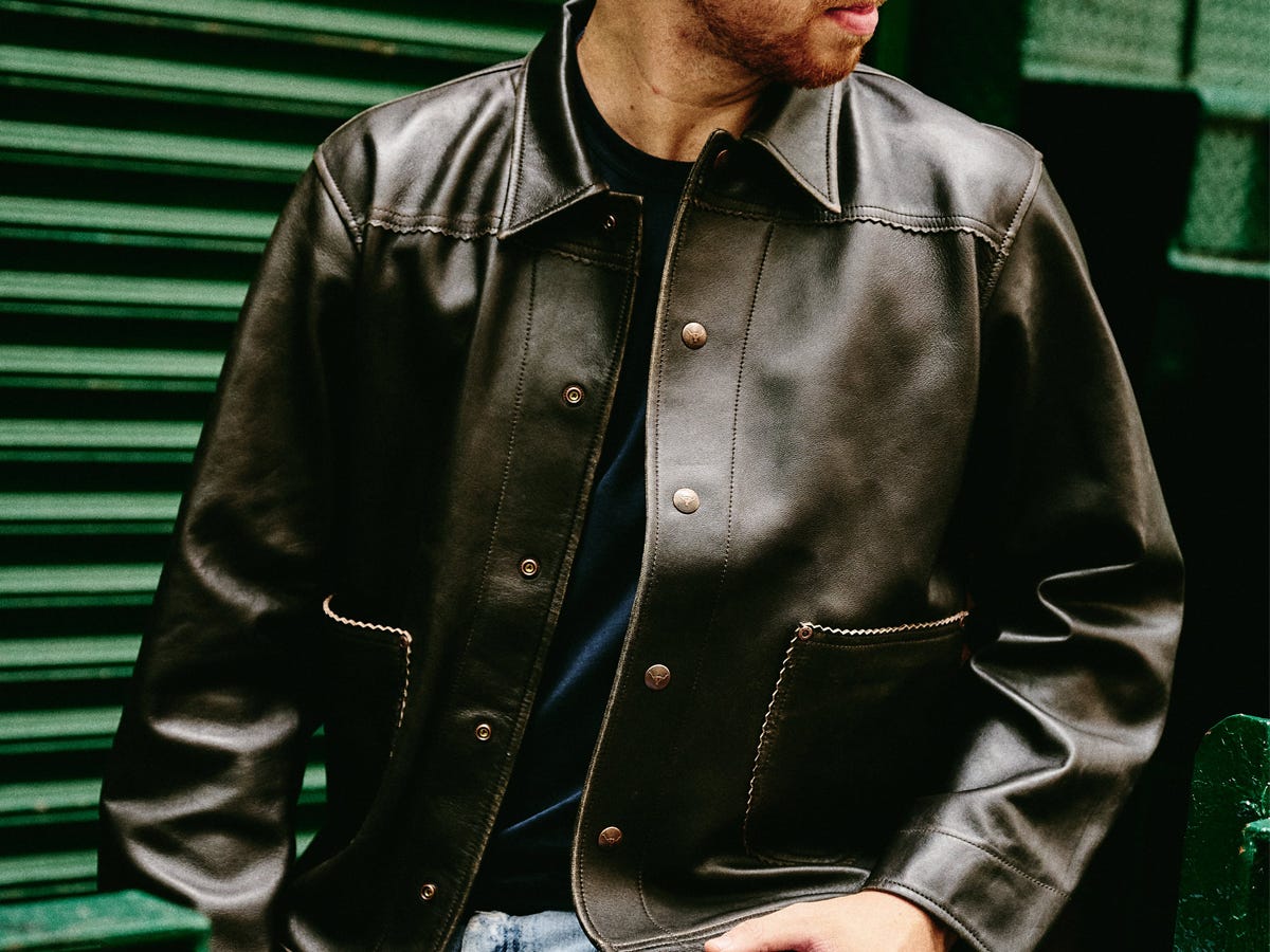 A model wearing the Huckberry x Wythe Feathered Lambskin Ranch Jacket.