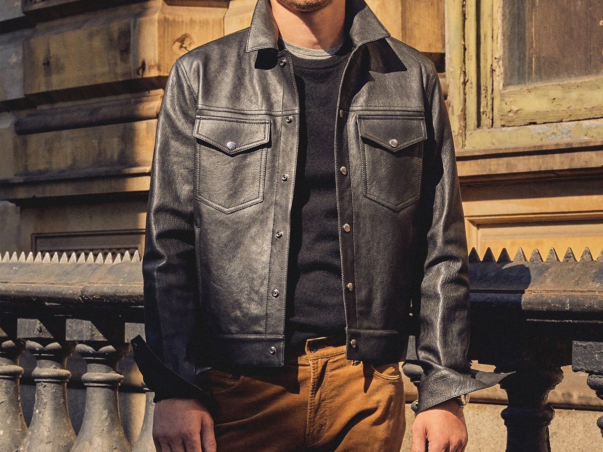 A model wearing a black Todd Snyder Burnished Leather Dylan Jacket.